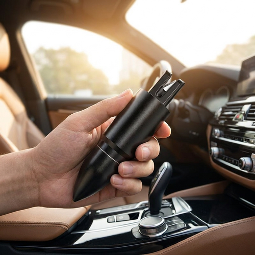 Car emergency window breaker in use - lifestyle