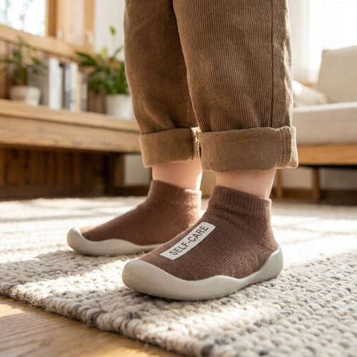 Soft-bottom baby indoor shoes worn - lifestyle