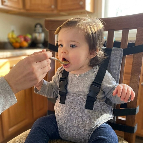 Baby feeding chair safety belt in use - lifestyle
